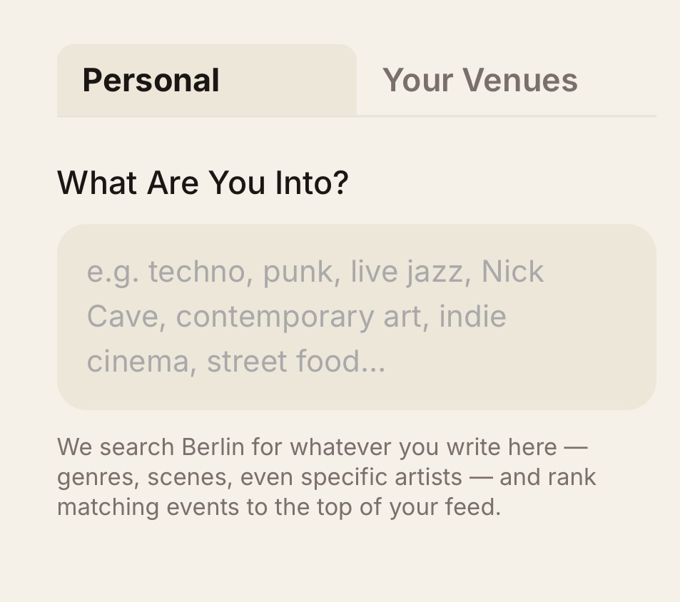 The app&rsquo;s What Are You Into? screen: a free-text field with example interests like techno, punk, live jazz, Nick Cave, contemporary art